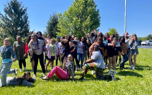 students and staff in Dodge Girls' Group