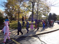 Students marching in Fall Harvest Party Parade.