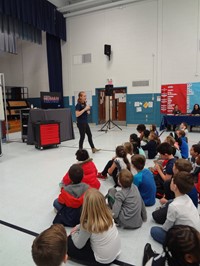 Students at COSI assembly