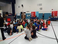 Students at COSI assembly