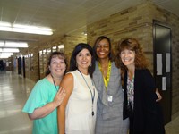 Teachers and staff posing for picture.