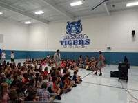 First day of school assembly in gym.