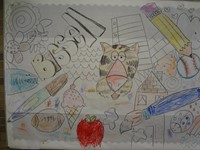 Bulletin board with drawings by art teacher.