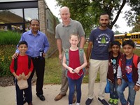 Group of Fathers with Students