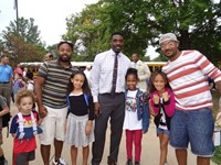 Group of Fathers with Students