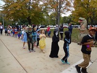 Students walking in Harvest Parade