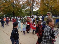 Students walking in Harvest Parade