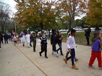 Students walking in Harvest Parade