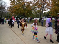 Students walking in Harvest Parade