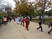 Students walking in Harvest Parade