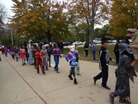 Students walking in Harvest Parade