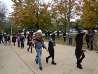 Students walking in Harvest Parade