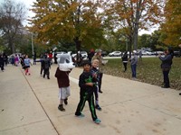 Students walking in Harvest Parade