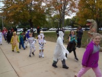 Students walking in Harvest Parade