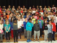 Students singing at Veterans day performance