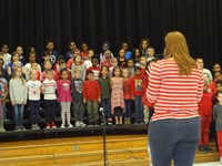 Students singing at Veterans day performance