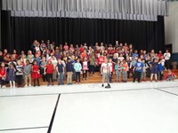 Students singing in Veterans day performance