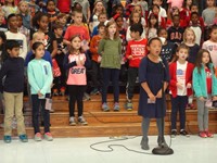 Students singing in Veterans day performance