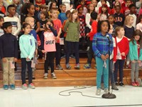 Students singing in Veterans day performance