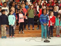 Students singing in Veterans day performance