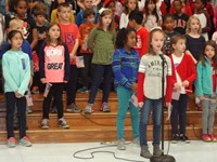 Students singing in Veterans day performance