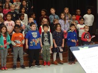 Students singing in Veterans day performance