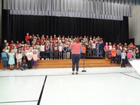 Students singing in Veterans day performance