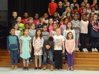 Students singing in Veterans day performance