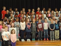 Students singing in Veterans day performance