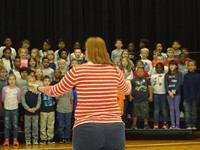 Students singing in Veterans day performance