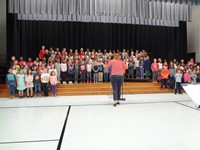 Students singing in Veterans day performance