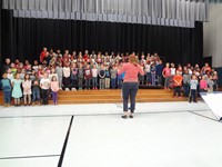 Students singing in Veterans day performance