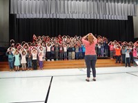 Students singing in Veterans day performance