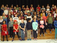 Students singing in Veterans day performance