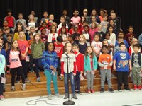 Students singing in Veterans day performance