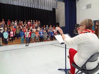 Students singing in Veterans day performance