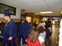 Graduating Students walking through Bissell