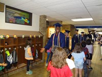 Graduating Students walking through Bissell