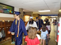 Graduating Students walking through Bissell