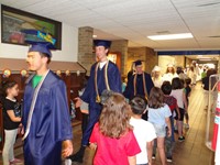 Graduating Students walking through Bissell