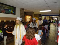 Graduating Students walking through Bissell