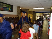 Graduating Students walking through Bissell