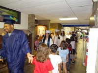 Graduating Students walking through Bissell