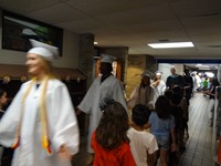 Graduating Students walking through Bissell