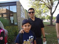 Fathers walking students to school