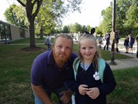 Fathers walking students to school