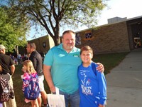 Fathers walking students to school