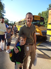 Fathers walking students to school