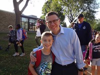 Fathers walking students to school