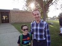 Fathers walking students to school